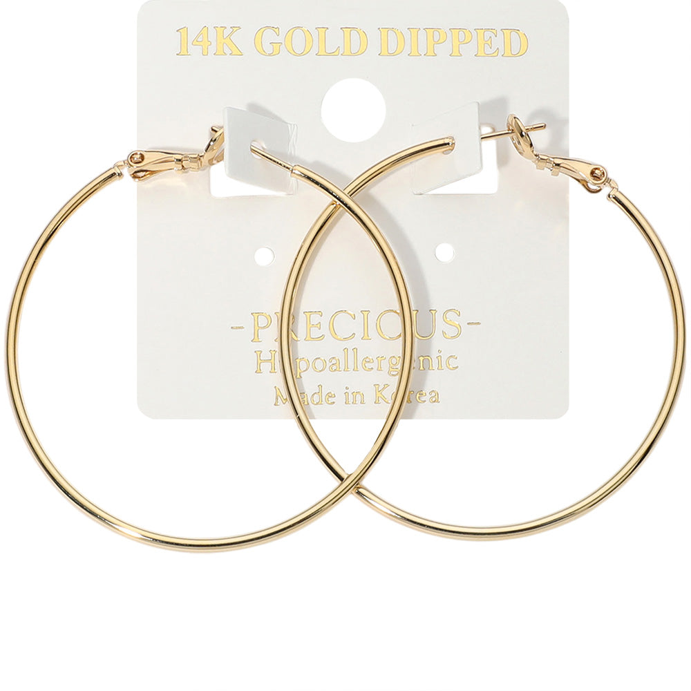 14K Gold Dipped Hoop Earrings on an earring card that says hypoallergenic. 1.8"