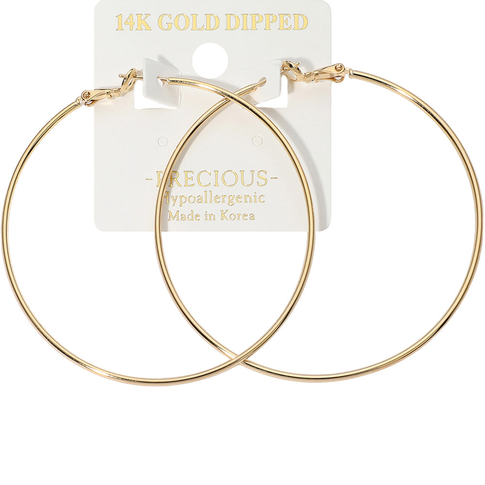 14K Gold Dipped Hoop Earrings on an earring card that says hypoallergenic. 2.6"