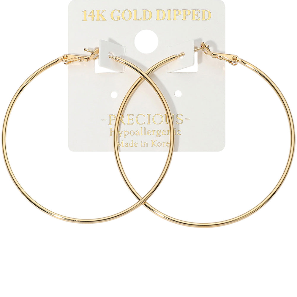 14K Gold Dipped Hoop Earrings on an earring card that says hypoallergenic 2.2"