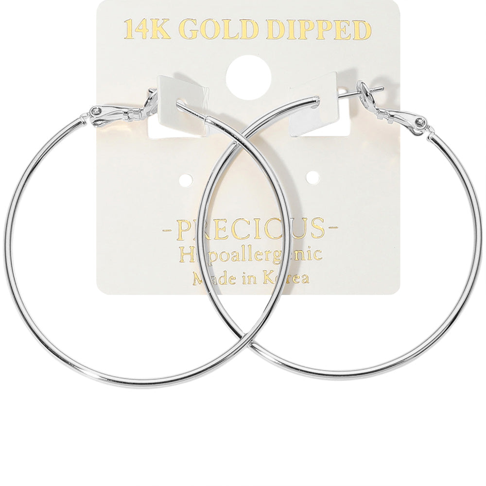 14K Gold Dipped Hoop Earrings on an earring card that says hypoallergenic. Gold Dipped but shown with a silver coating. 1.8"