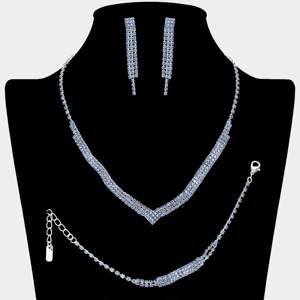 3 piece Sapphire Light Blue crystal rhinestone fringe necklace set on silver with matching bracelet and earrings on a black necklace bust