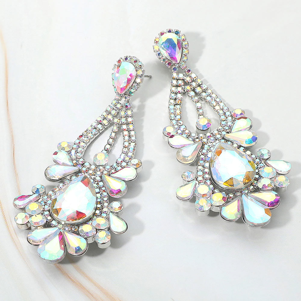 AB chandelier teardrop statement earrings on silver for prom or pageant wear on a light background
