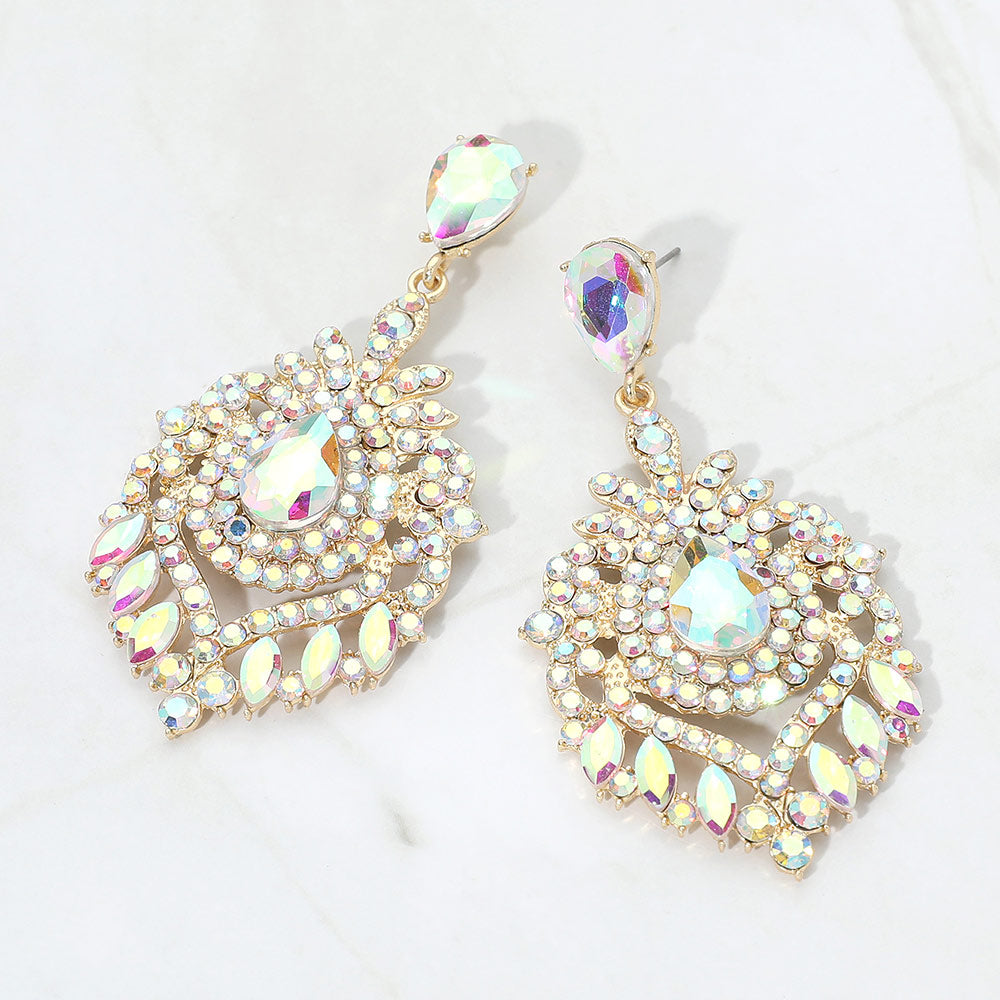 AB crystal teardrop chandelier statement pageant earrings on gold with an ornate layered crystal design, displayed on a white background.