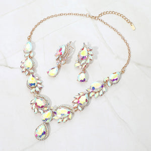 AB teardrop formal necklace and matching earrings set on gold displayed on a white background.