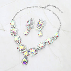 AB teardrop formal necklace and matching earrings set on silver displayed on a white background.