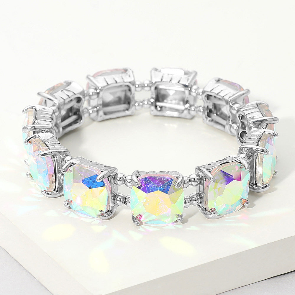 AB cushion square stone stretch evening bracelet on silver, iridescent statement bracelet on a white background