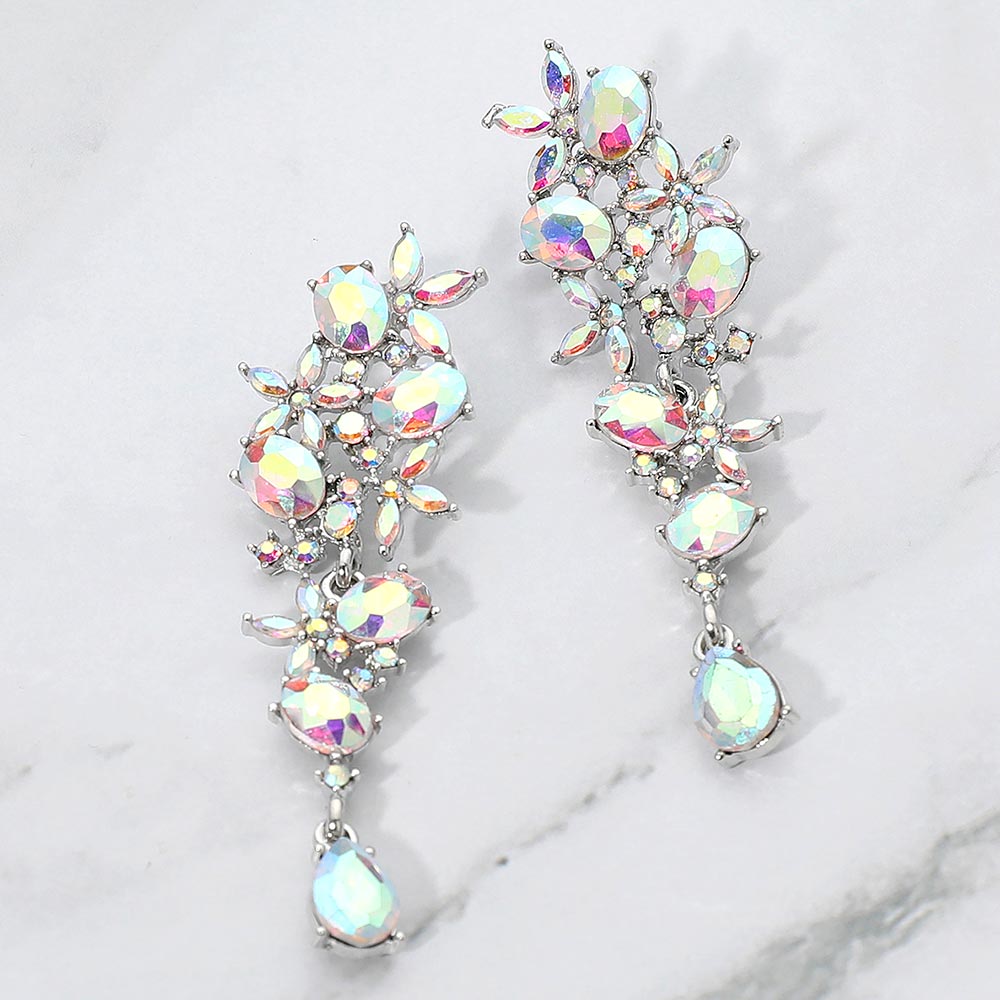 AB on silver floral crystal cluster earrings with marquise and oval stones for interviews or evening shine on a marble background