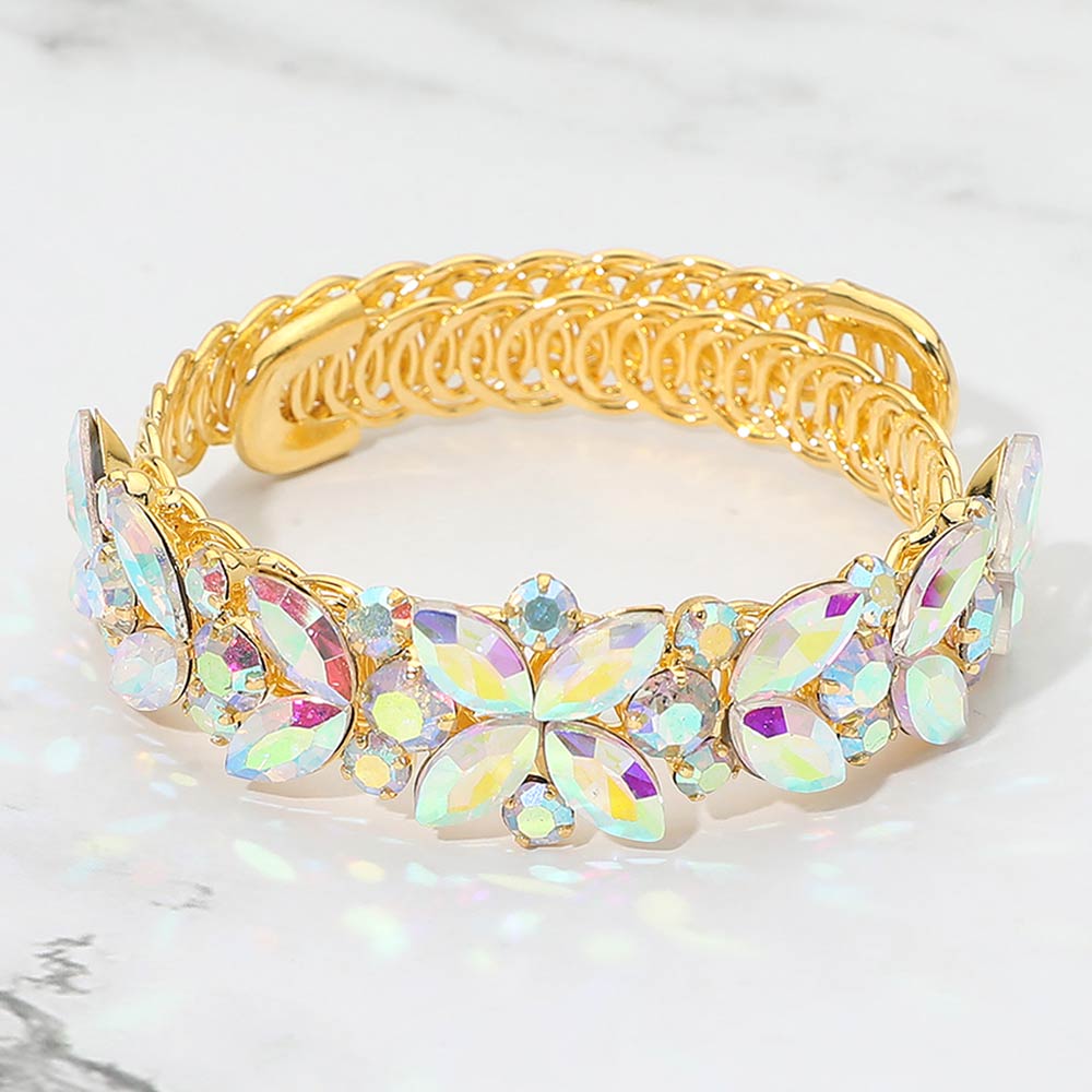 AB marquise floral crystal bracelet on gold with adjustable fit, iridescent statement jewelry for prom and evening wear on a marble background