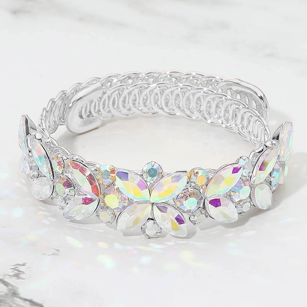AB marquise floral crystal bracelet on silver with adjustable fit, iridescent statement jewelry for prom and evening wear on a marble background
