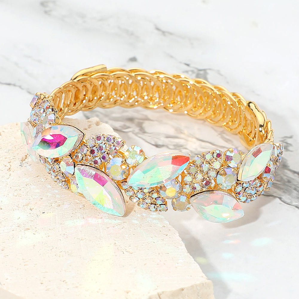 AB marquise stone cluster adjustable bracelet on gold on marble surface
