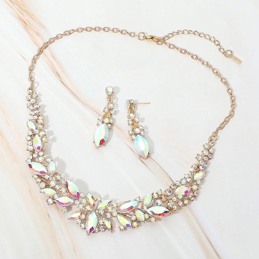 AB marquise stone cluster prom and evening necklace set on gold on white marble background