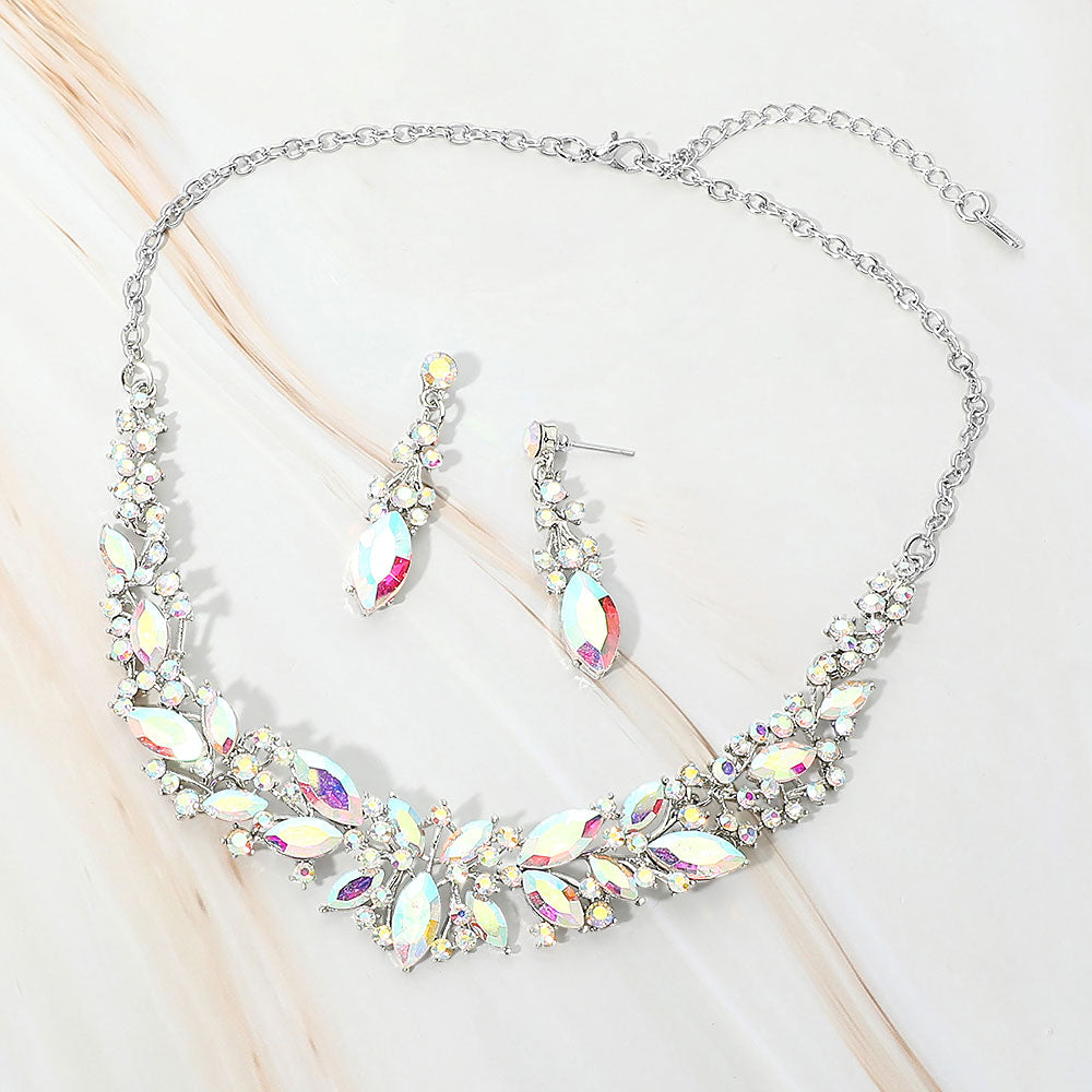 AB marquise stone cluster prom and evening necklace set on silver on white marble background