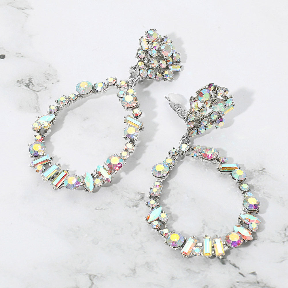 AB mixed stone cluster open teardrop clip-on pageant earrings on silver on a white background