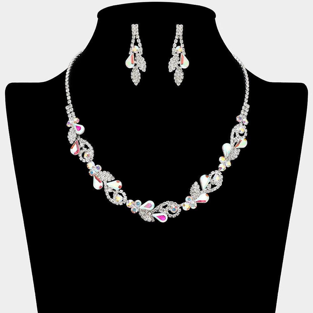 AB rhinestone leaf cluster necklace set with teardrop crystal earrings, silver backed, for prom and evening wear on a black mannequin bust.