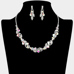 AB rhinestone leaf cluster necklace set with teardrop crystal earrings, silver backed, for prom and evening wear on a black mannequin bust.