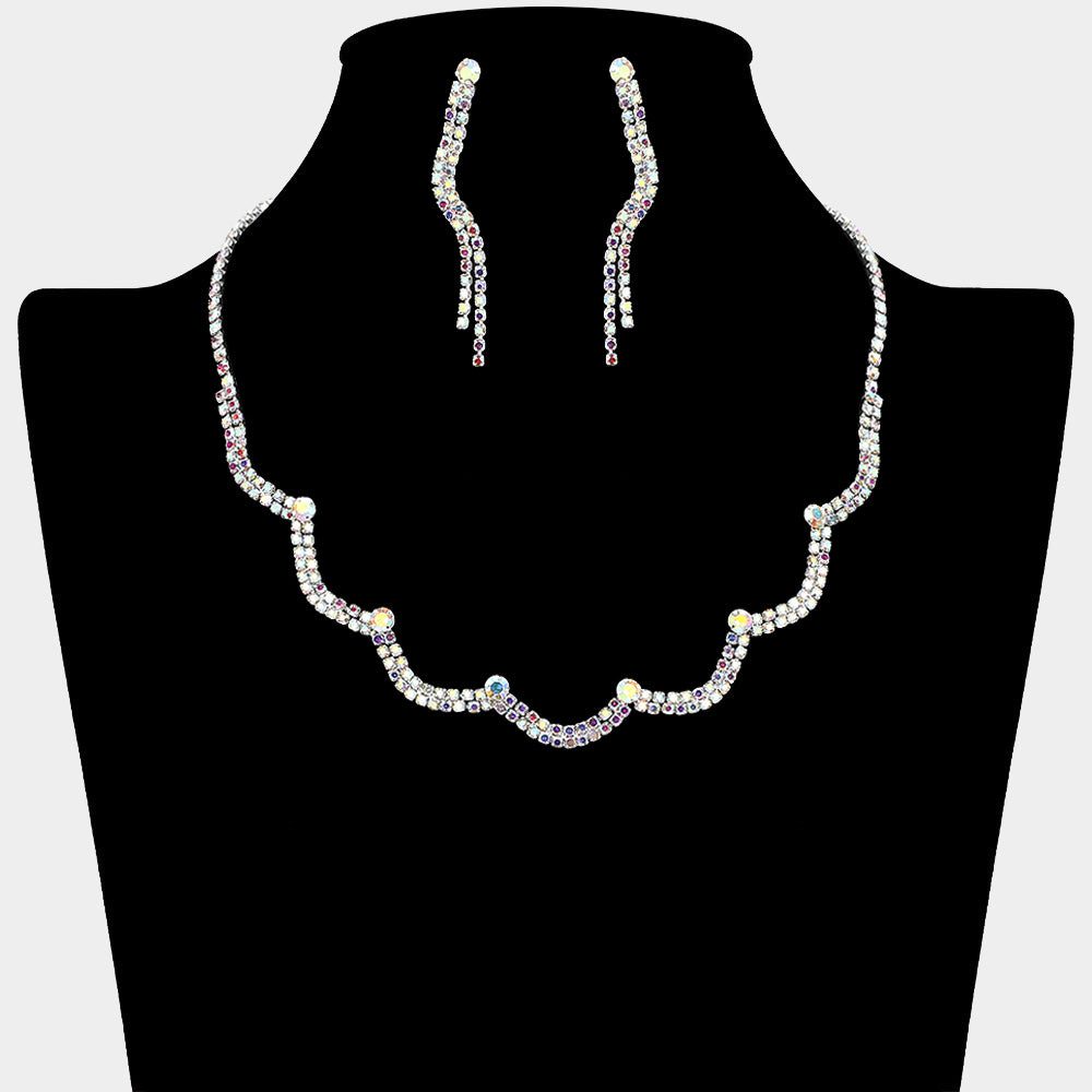 AB rhinestone on silver curved necklace set with matching drop earrings for pageant or prom sparkle on a black mannequin bust