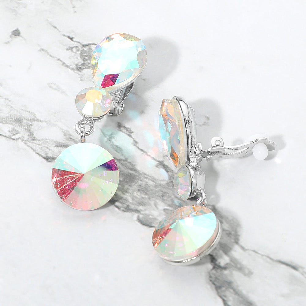 AB round crystal drop clip-on earrings on silver with iridescent stones on white marble background