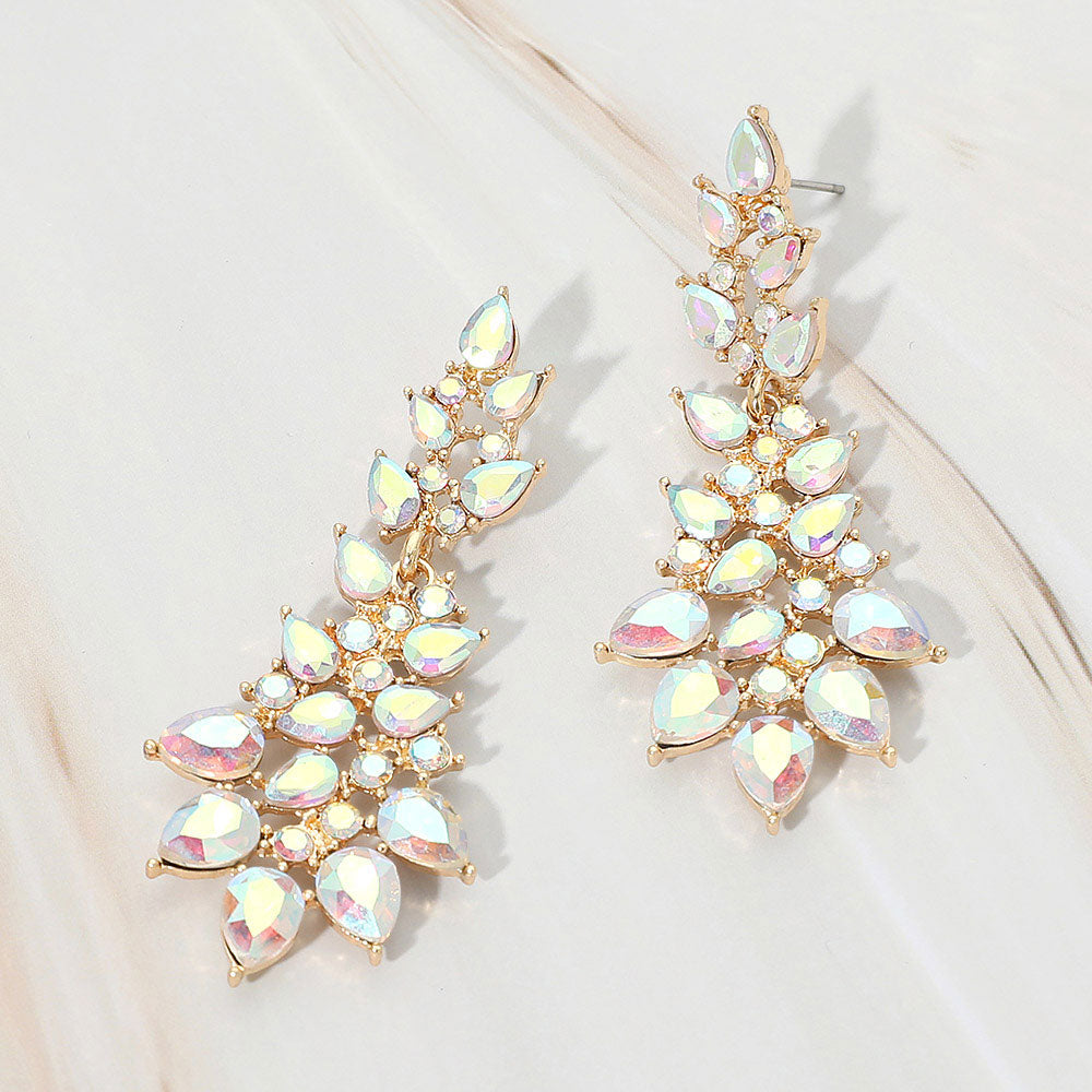 AB teardrop cluster drop earrings on gold with iridescent faceted stones on white marble background