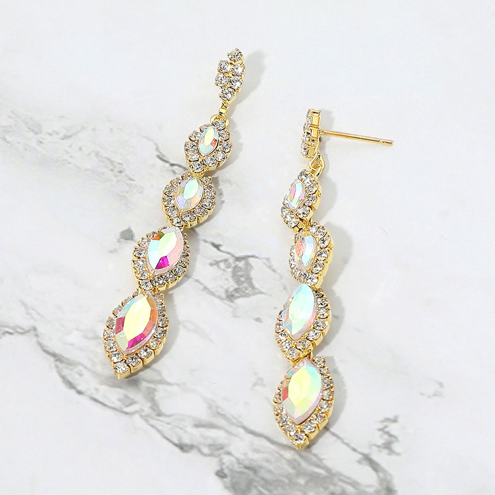 AB vintage marquise stone link drop formal evening earrings on gold with iridescent rhinestones on white marble background