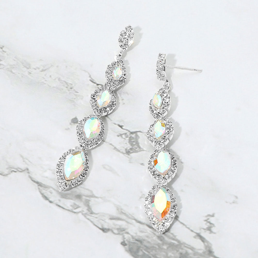 AB vintage marquise stone link drop formal evening earrings on silver with iridescent rhinestones on white marble background