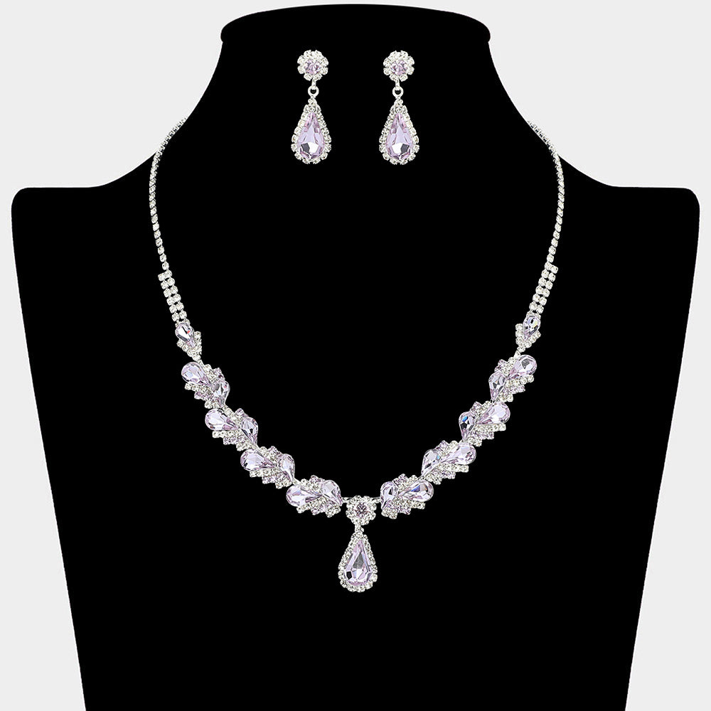 Amethyst marquise pendant necklace set on silver with matching earrings for prom and evening wear on a black mannequin bust on a white background.
