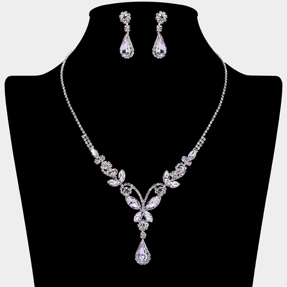 Purple amethyst teardrop butterfly rhinestone necklace set on silver displayed on black bust background