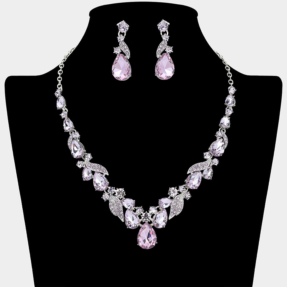 Amethyst purple teardrop leaf prom necklace set on silver with matching earrings displayed on a black mannequin bust on a white background.