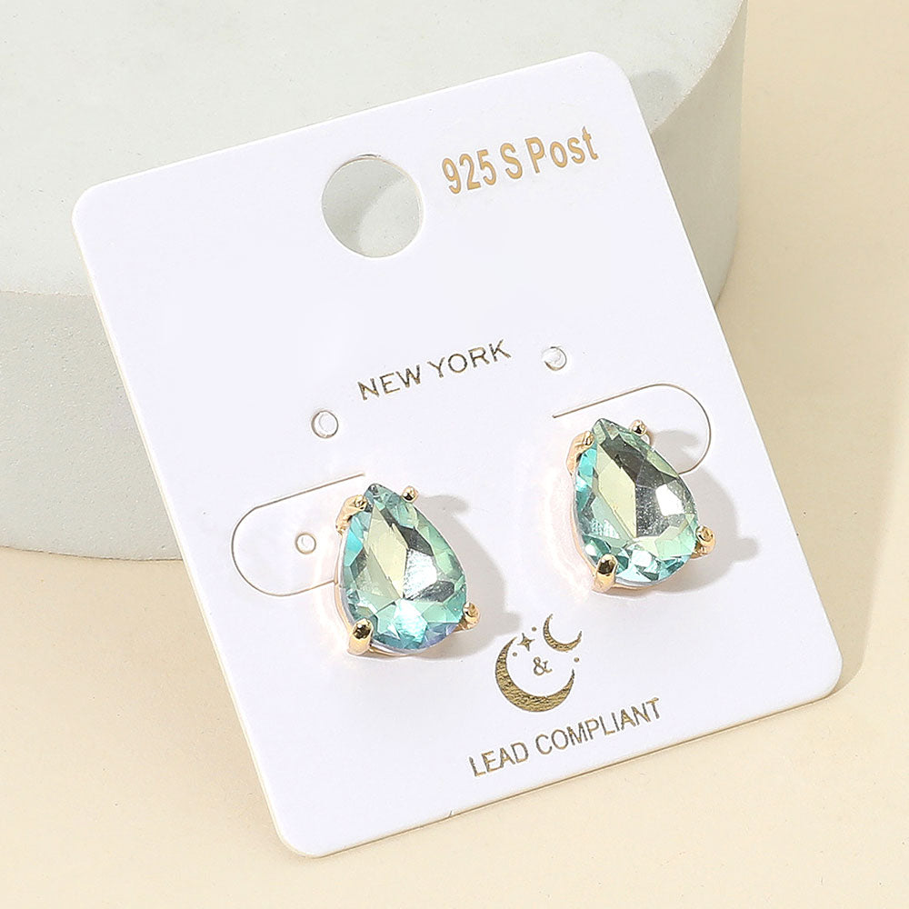 Teardrop-shaped Aqua gemstone earrings on a white card with gold text.