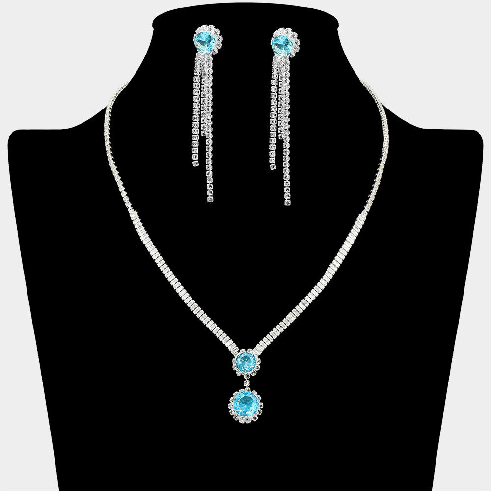 Aqua round CZ crystal drop necklace set with silver-tone rhinestone chain and matching long dangle earrings on a black mannequin bust.