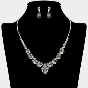 Smoky grey teardrop marquise prom necklace set on silver with matching earrings displayed on a black mannequin bust on a white background.