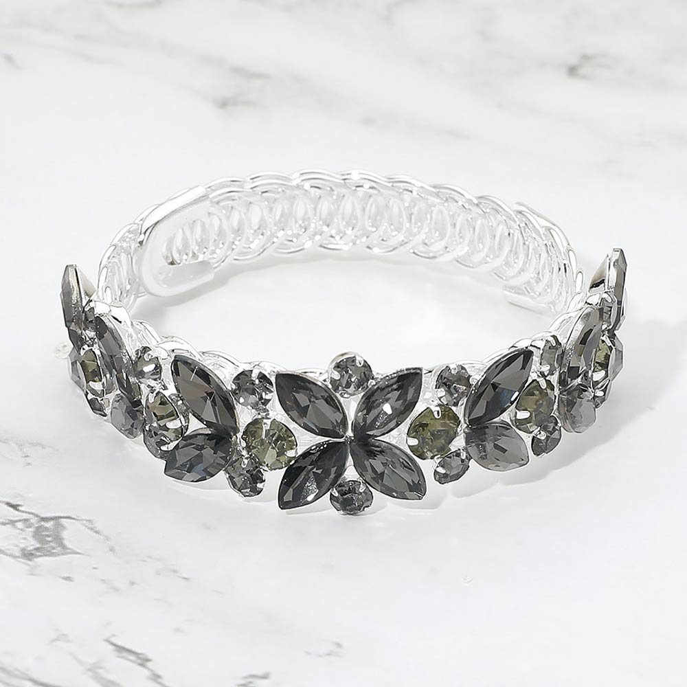 Smoky gray crystal floral bracelet on silver featuring marquise stones, refined pageant and formal jewelry on a marble background