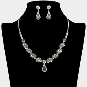Black diamond marquise pendant necklace set on silver with matching earrings for prom and evening wear on a black mannequin bust on a white background.