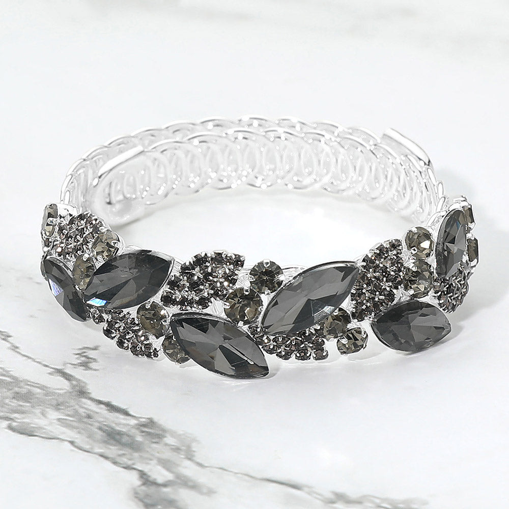 Smoky Grey marquise stone cluster adjustable bracelet on silver on marble surface