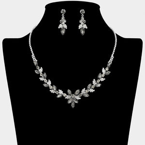 Smoky grey marquise floral rhinestone necklace set on silver displayed on black bust background