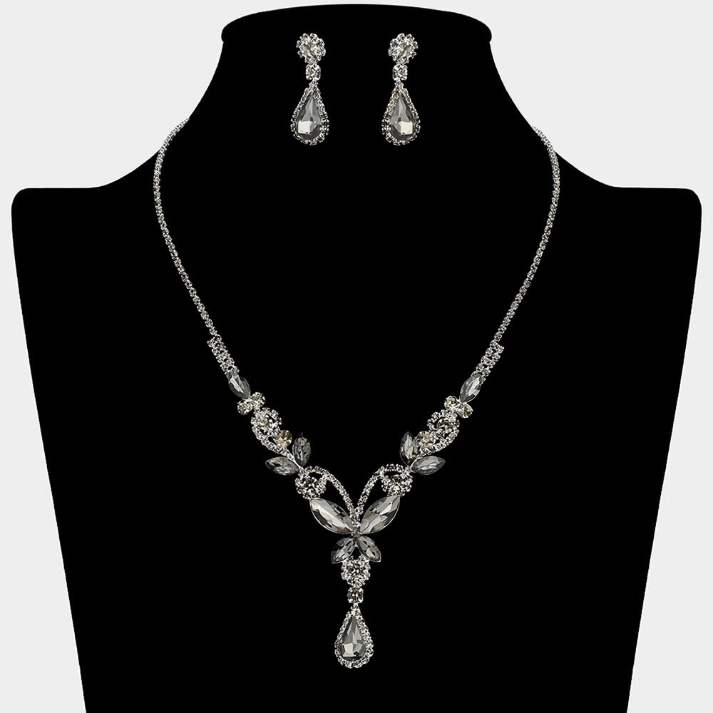 Smoky grey teardrop butterfly rhinestone necklace set on silver displayed on black bust background