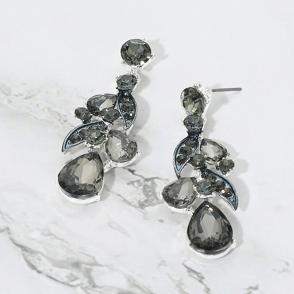 Smoky Grey teardrop crystal cluster drop prom and formal earrings on silver on white marble background