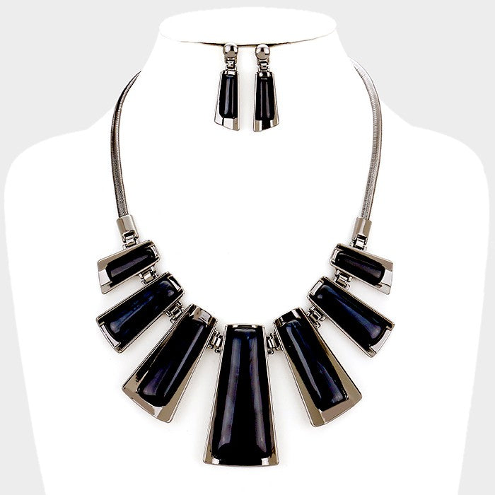 Black Enamel Bar Metal statement necklace with matching earrings on a white mannequin bust