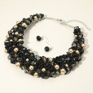 Black faceted beaded collar necklace set with matching earrings in a bold fun fashion style
