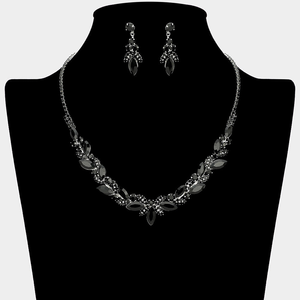 Black marquise leaf rhinestone necklace set on silver displayed on black bust background