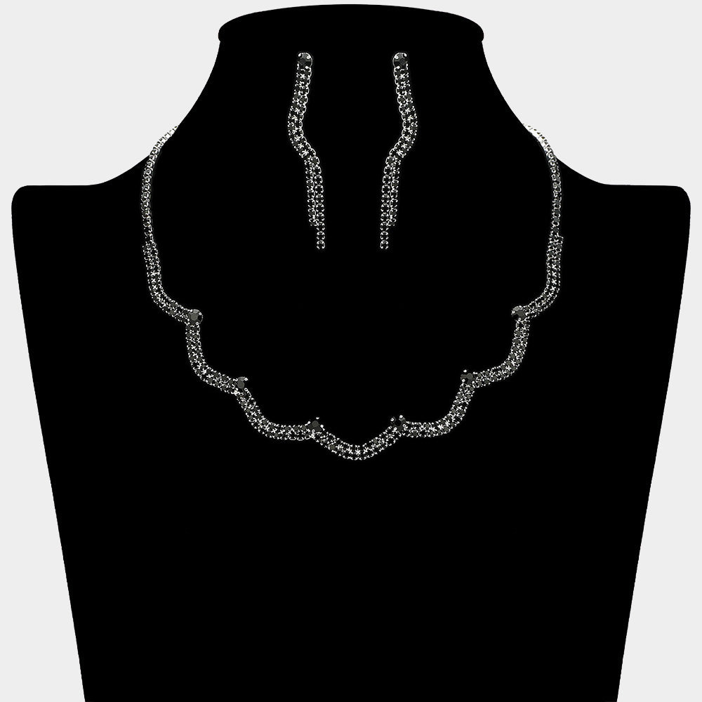 Black rhinestone curved necklace set with drop earrings for prom or evening elegance on a black mannequin bust
