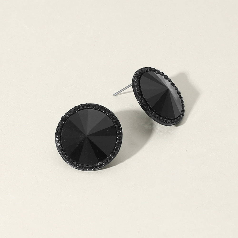 black round center crystal surrounded by  black rhinestones stud earrings on silver post on a white background – elegant statement jewelry for prom or pageant looks