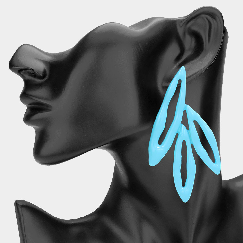 Blue abstract geometric fun fashion statement drop earrings displayed on a black mannequin