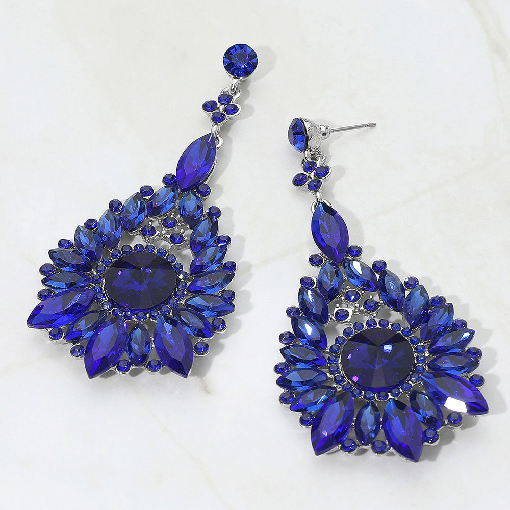 Sapphire royal blue marquise & round teardrop statement earrings for prom or pageant wear on a white background