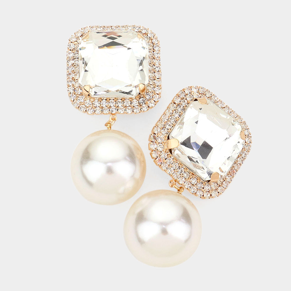 Clear square stone cream pearl link dangle clip-on earrings with gold-tone setting on a light gray background