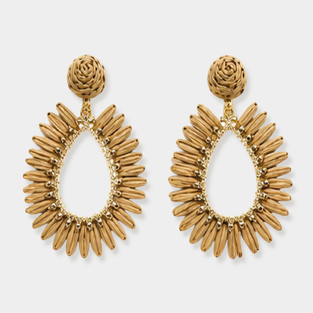 Champagne-gold woven raffia open teardrop earrings on gold with post backs isolated on a white background.