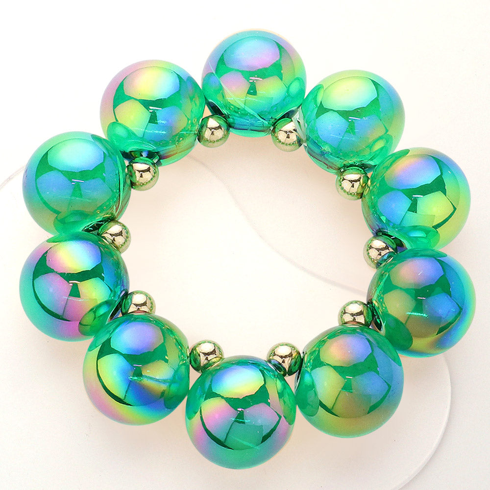 Chunky green iridescent balls/spheres bracelet on a white background