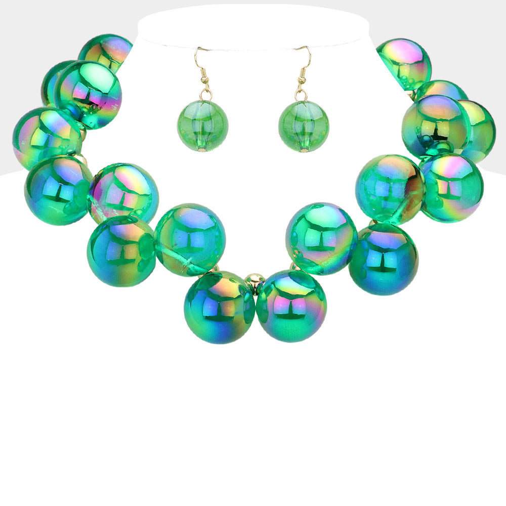 Chunky green iridescent balls/spheres necklace with matching earrings on a white background