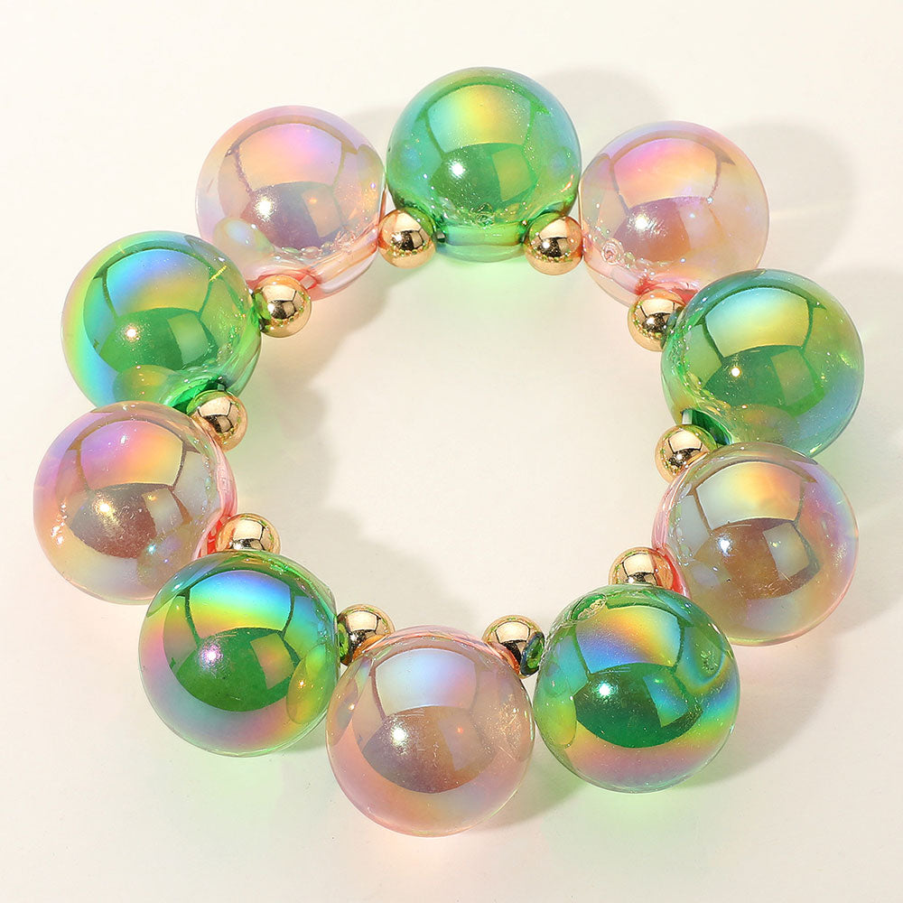 Chunky Pink & Green iridescent balls/spheres bracelet on a white background