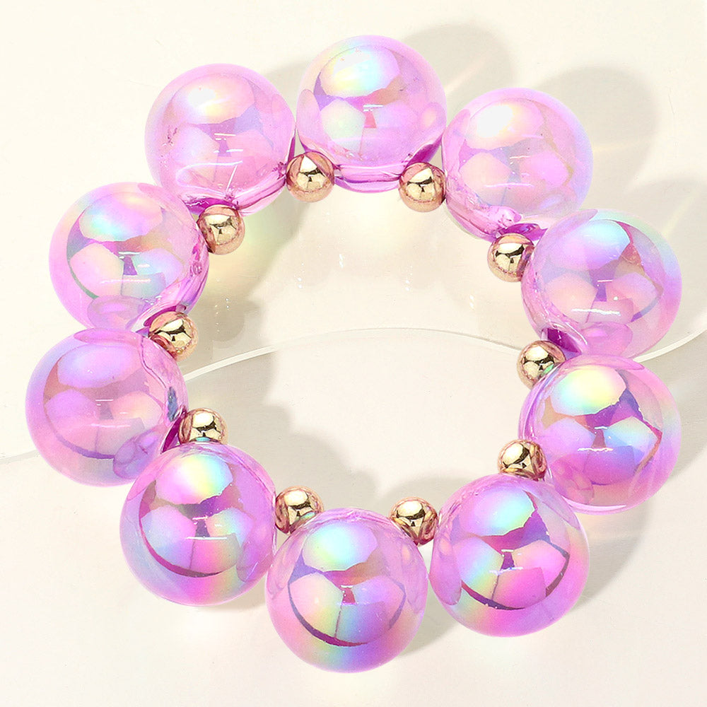 Chunky purple iridescent balls/spheres bracelet on a white background