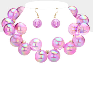 Chunky purple iridescent balls/spheres necklace with matching earrings on a white background